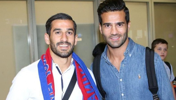 Iranian soccer stars Masoud Shojaei (right) and Ehsan Hajsafi (left).